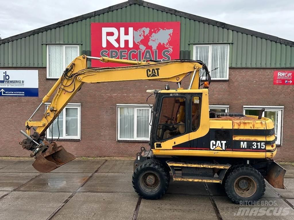 CAT M315 +ROTO CE Wheeled excavators