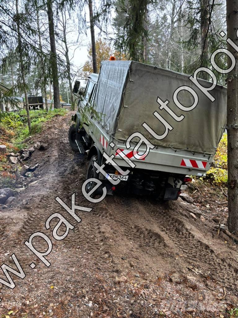 Unimog U 1250L DoKa Curtainsider trucks