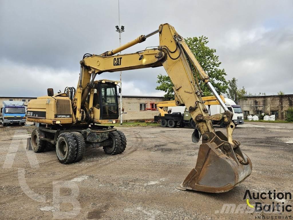 CAT M 318 C Wheeled excavators