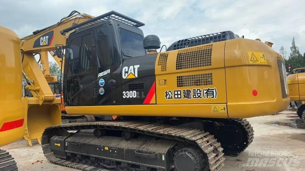CAT CAT330D2L Midi excavators  7t - 12t
