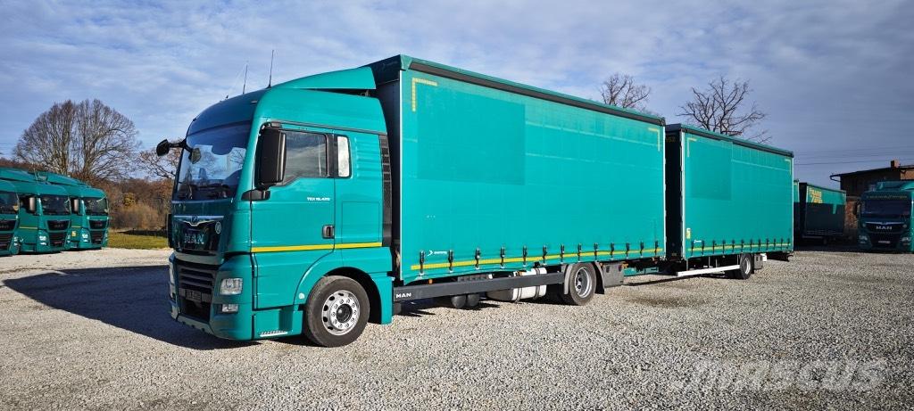 MAN TGX 18.420 Curtainsider trucks