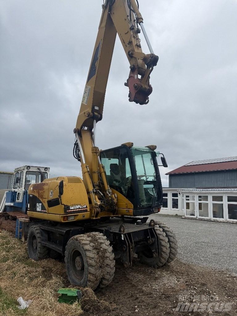 CAT M 313 C Wheeled excavators