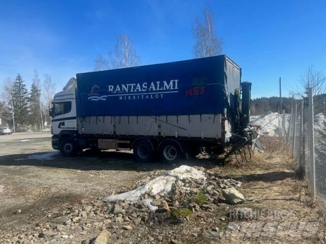 Scania R 12 LB Curtainsider trucks