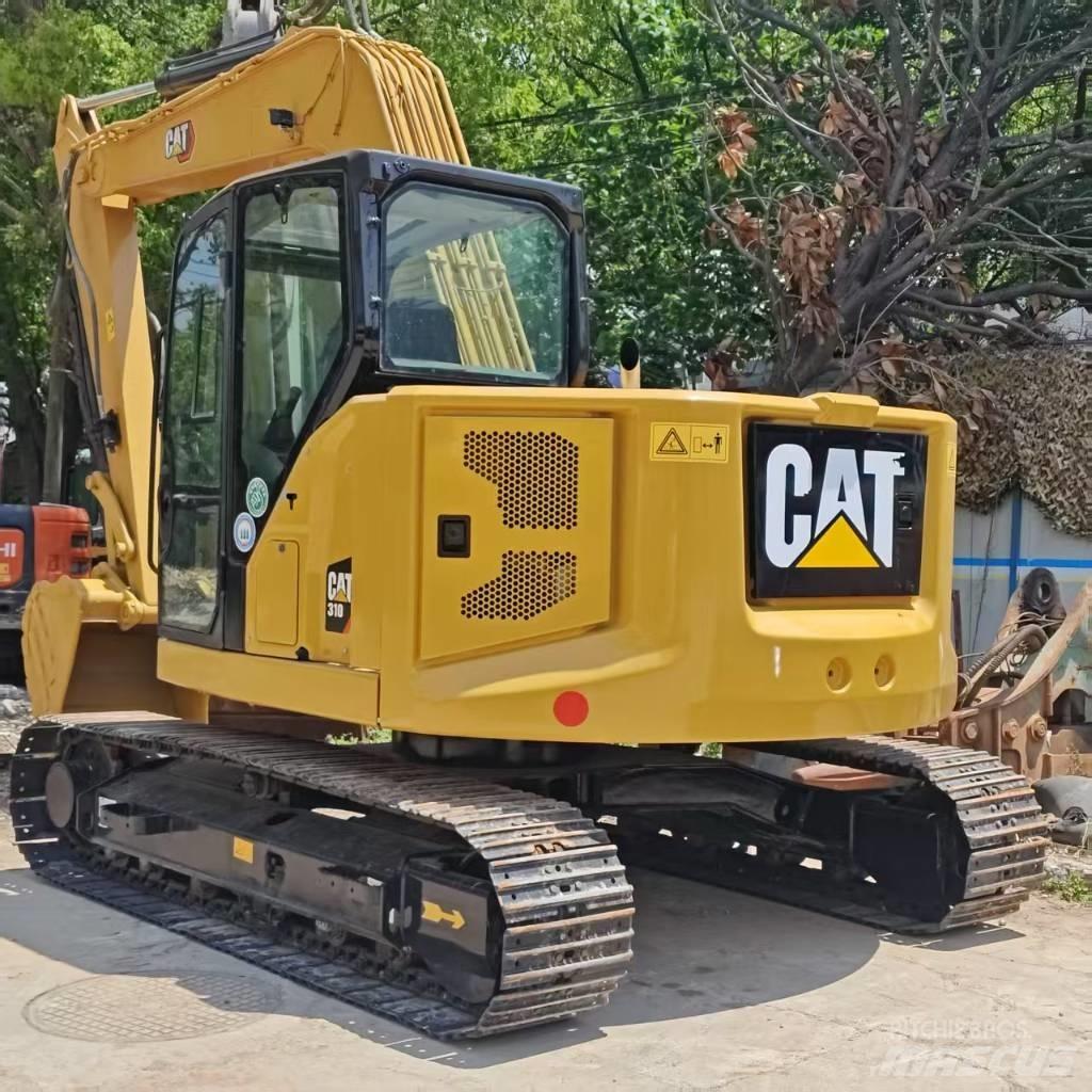 CAT 310 Midi excavators  7t - 12t
