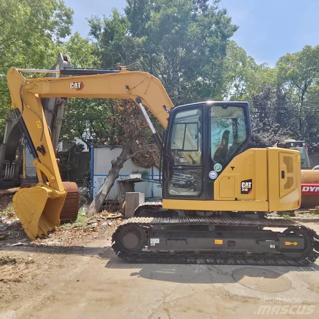 CAT 310 Midi excavators  7t - 12t
