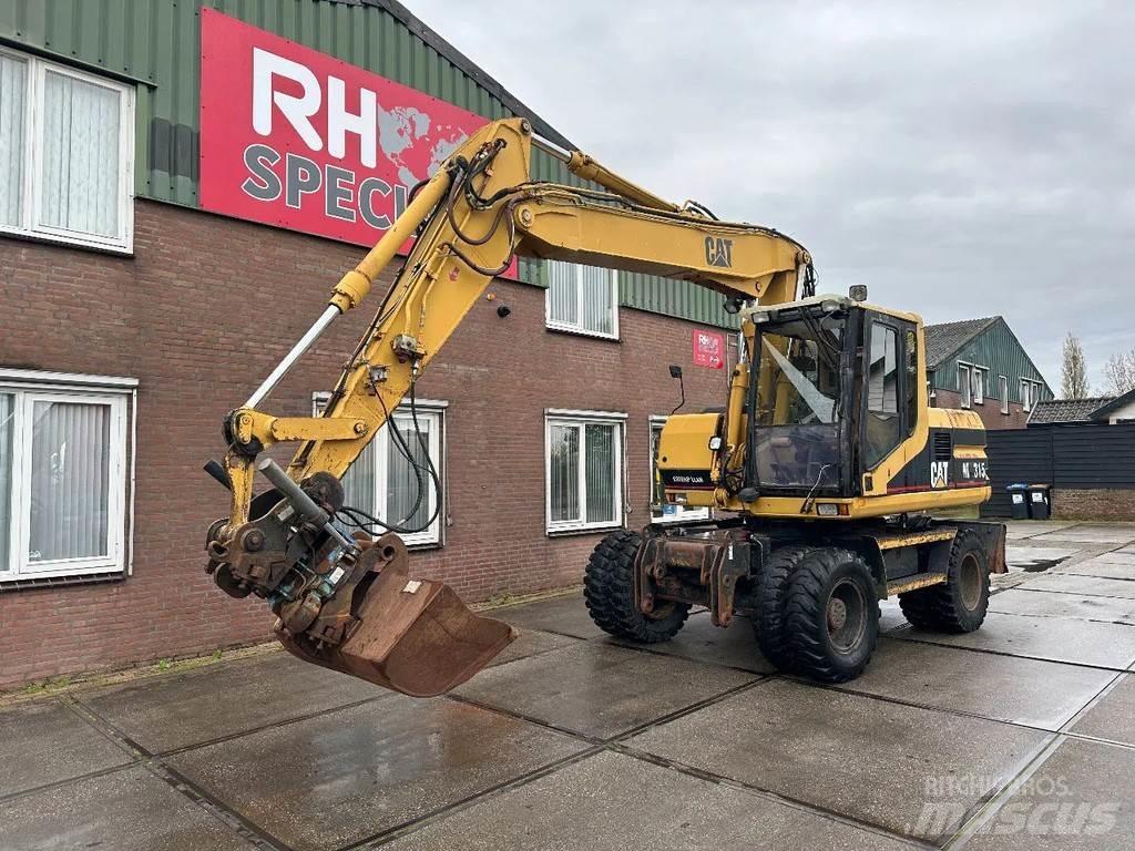 CAT M315 +ROTO CE Wheeled excavators