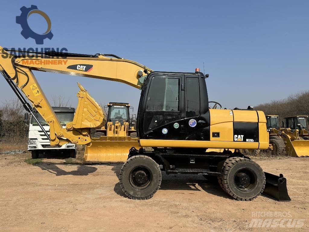 CAT M 320 D2 Wheeled excavators