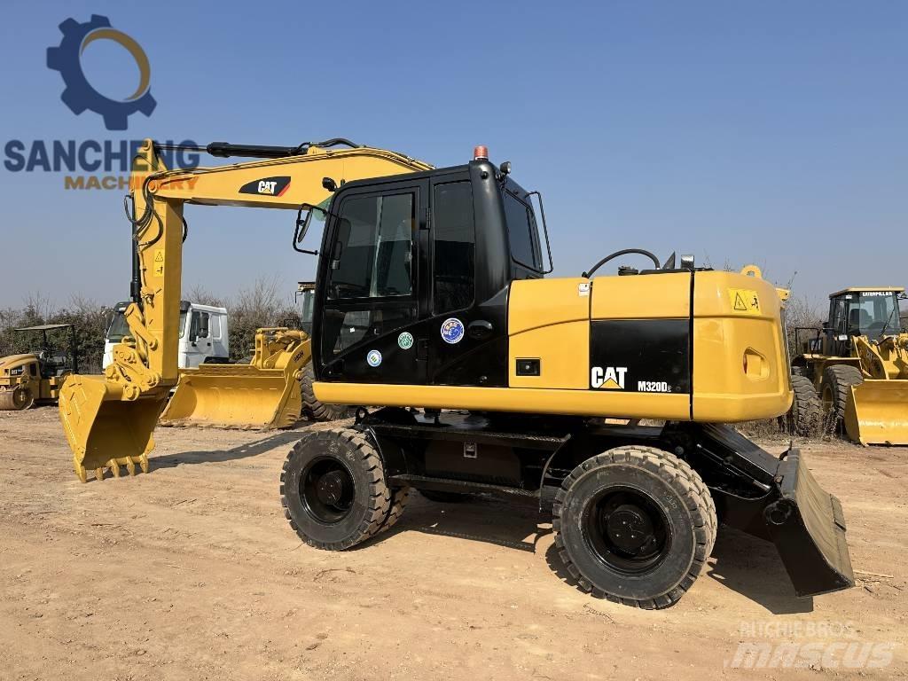 CAT M 320 D2 Wheeled excavators