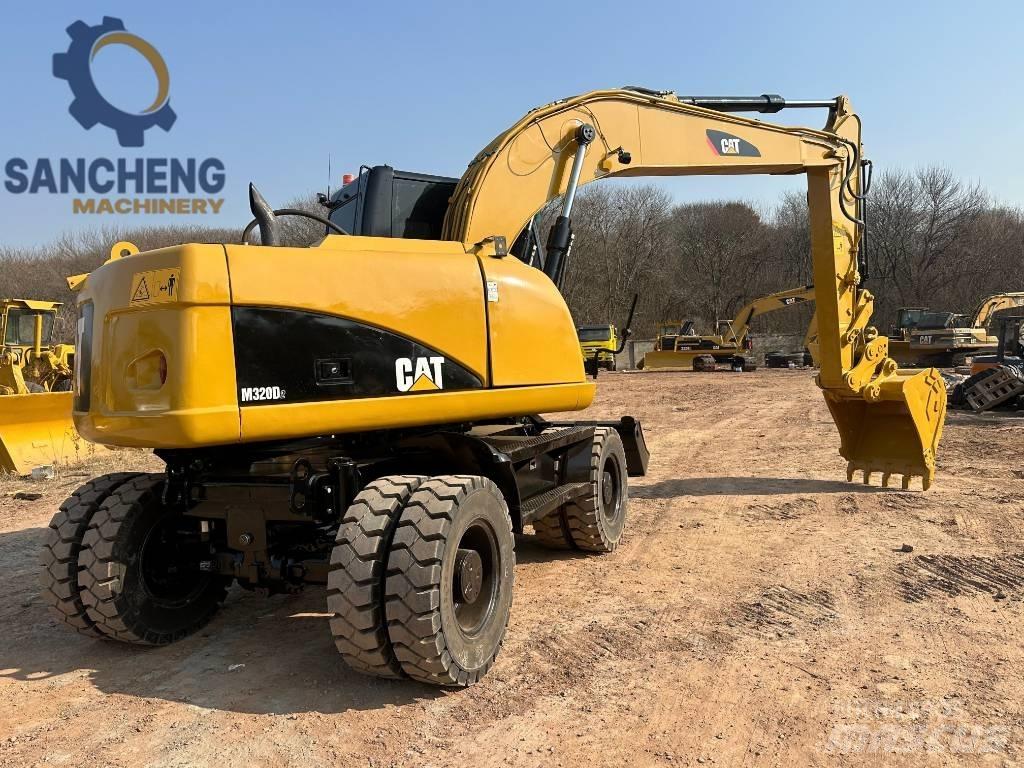 CAT M 320 D2 Wheeled excavators
