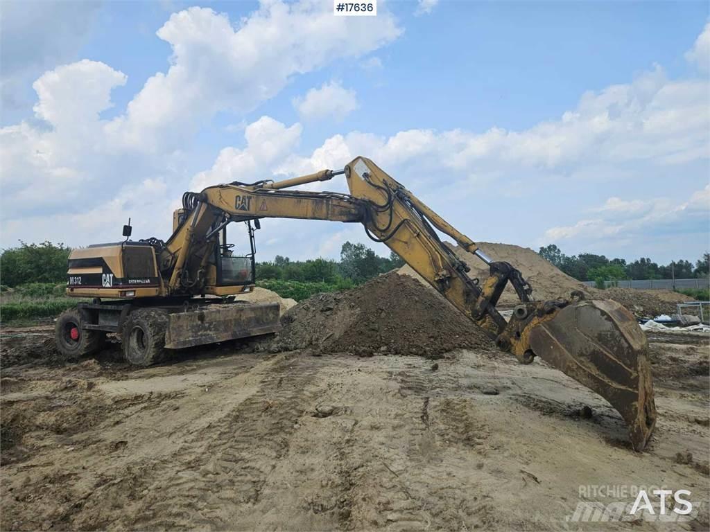 CAT M312 Wheeled excavators