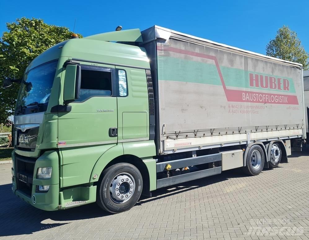 MAN 26.440 / 7.4m / LIFT Curtainsider trucks