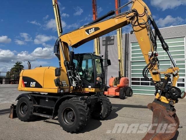 CAT M 313 D Wheeled excavators