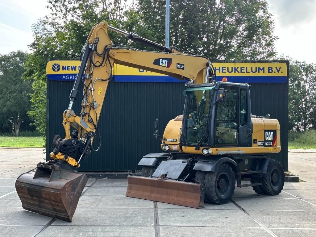 CAT M 313 D Wheeled excavators