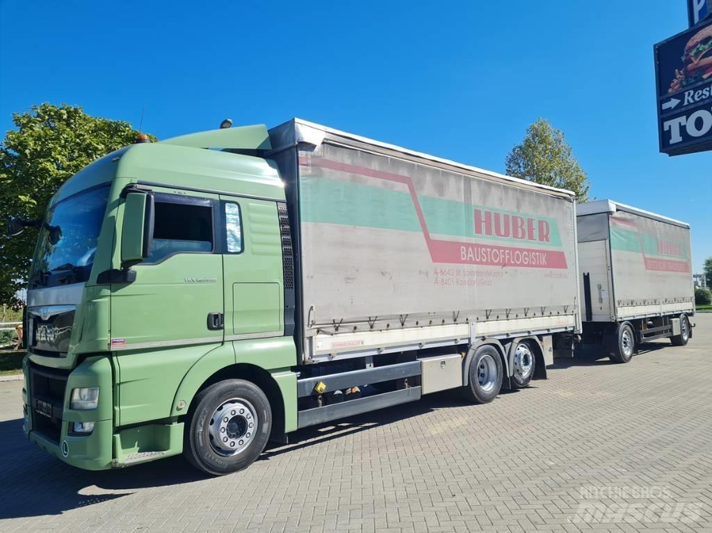 MAN 26.440  7.4 + 7.3 Curtainsider trucks