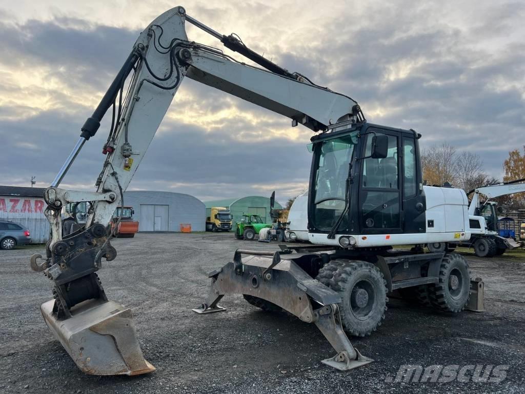 CAT M 313 D Wheeled excavators
