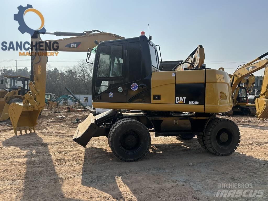 CAT M 320 D Wheeled excavators