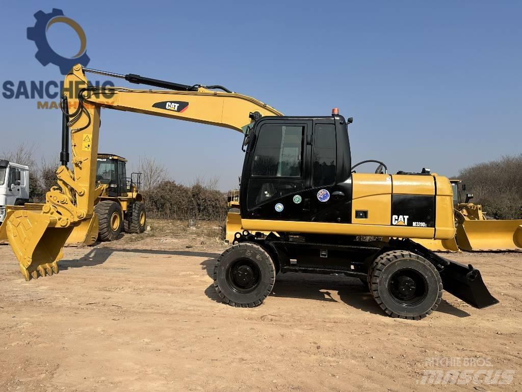 CAT M 320 D2 Wheeled excavators