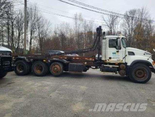 Mack CV713 Skip loader trucks