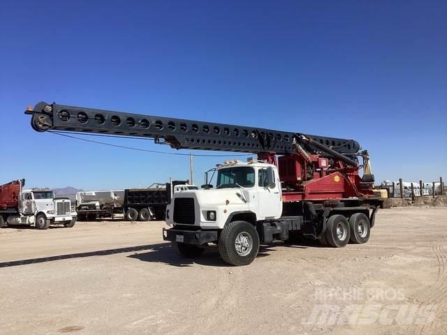 Mack DM690S Mobile drill rig trucks