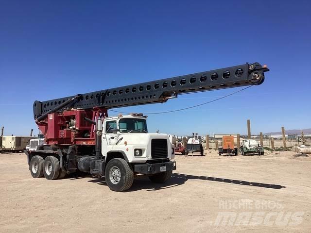 Mack DM690S Mobile drill rig trucks