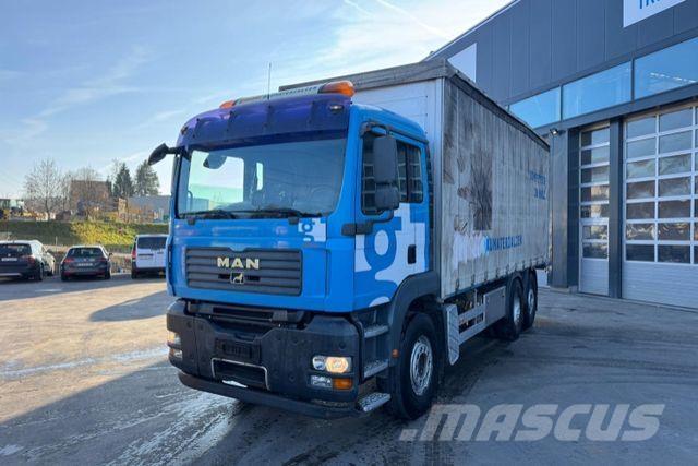 MAN TGA 26.440 6x2 Curtainsider trucks