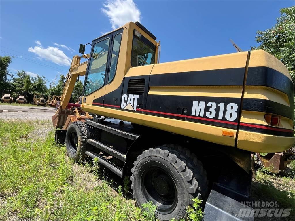 CAT M318 Wheeled excavators