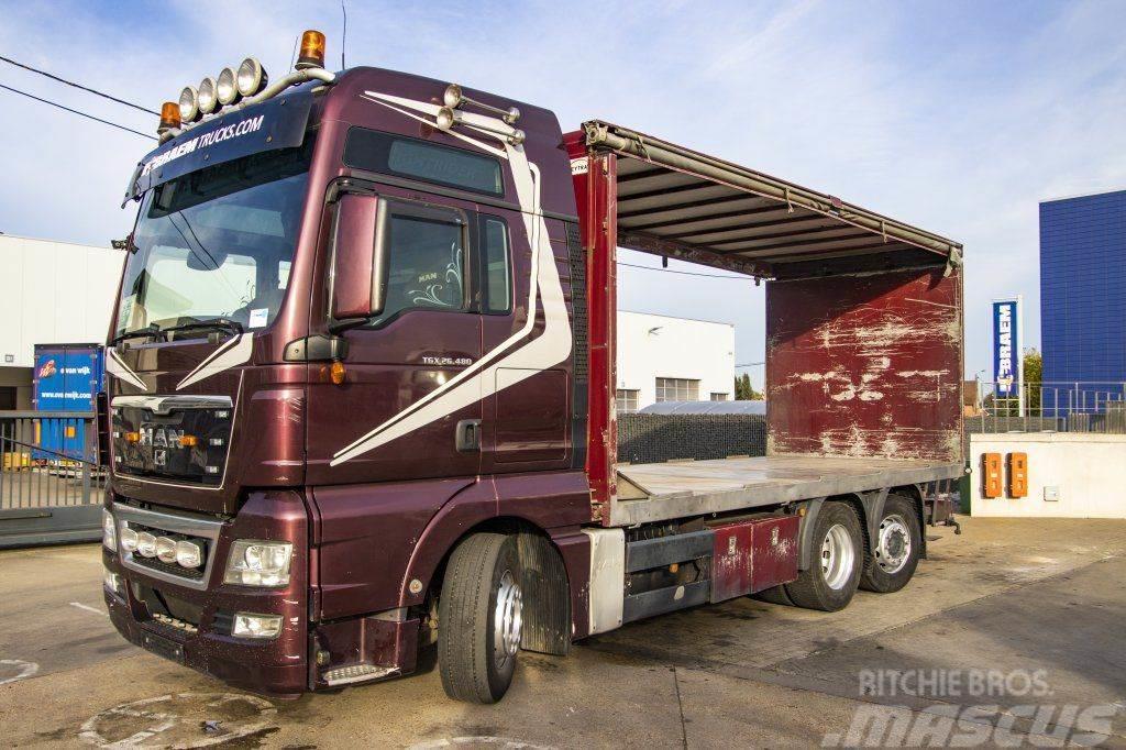 MAN TGX 26.480 XXL 6X2-4 ( gestuurd/Dir./steering/gele Curtainsider trucks