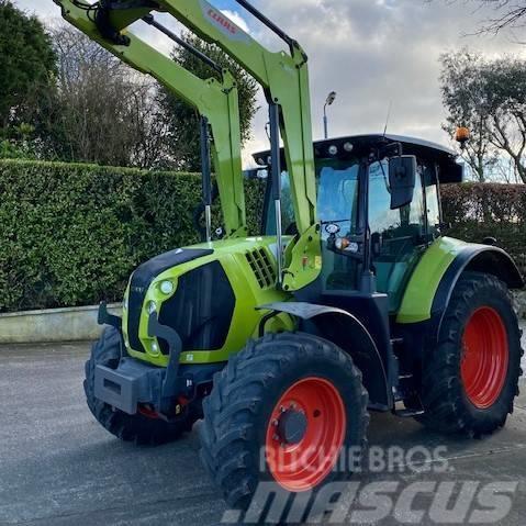 CLAAS Arion 510 CIS with FL120c Loader Tractors